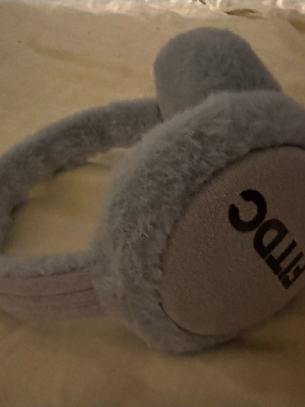 Plush Earmuffs in Light Gray with Visible Logo